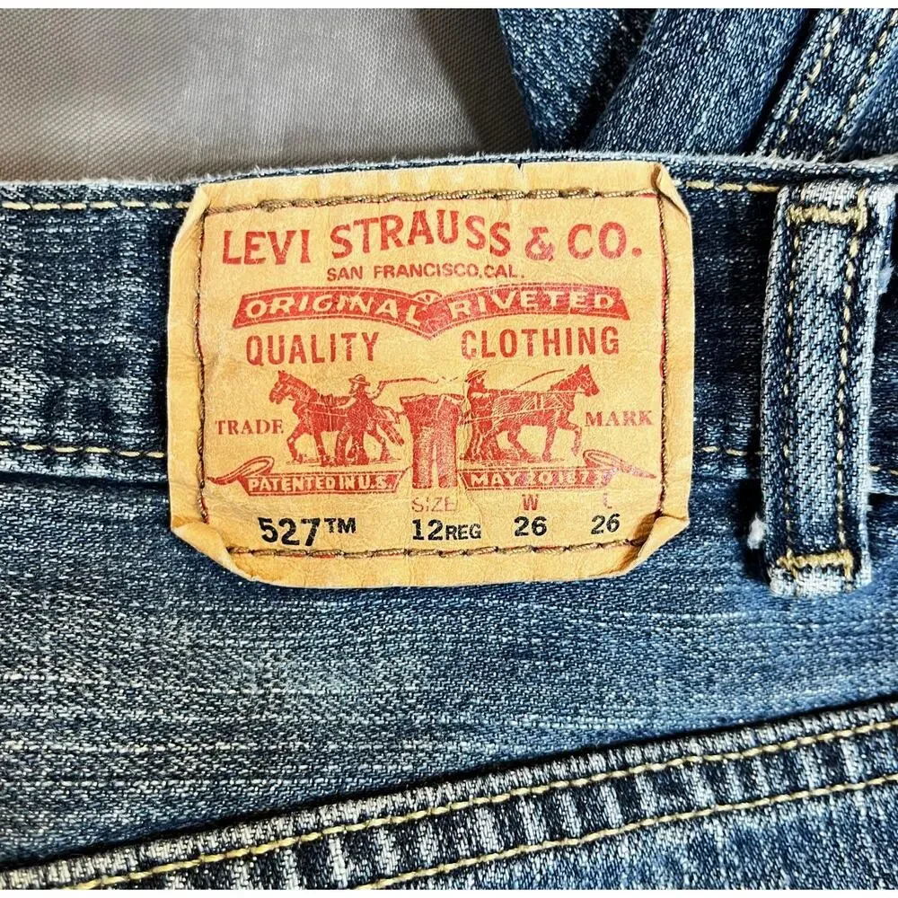 Levi's 527 Bootcut Denim Jeans Youth Size 12 Regular W26 L26 Distressed Hem
